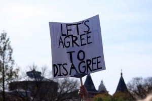 Sign reading "Let's Agree to Disagree"